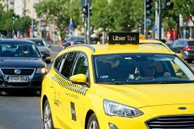 Uber changes contracts to limit UK taxi tax impact