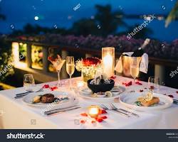 Imagem de Candlelit Romantic Dinner Table Setting