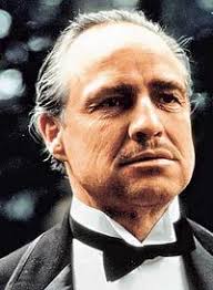 This moustache will work ... Marlon Brando as Don Vito Corleone. Marlon Brando repeatedly rejected playing the role of Don Corleone in The Godfather, ... - marlonbrando_narrowweb__200x273