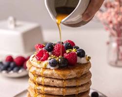 Image of Wholegrain pancakes with fruit and syrup