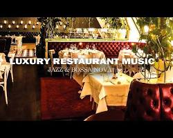Image of couple dining in a luxurious restaurant with soft jazz music playing in the background