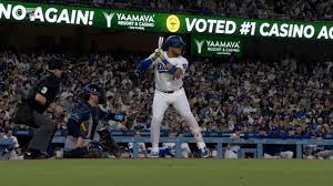 Miguel Rojas hitting a home run
