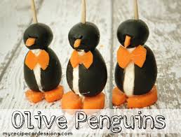 /></p> <p> </p> <p><strong>Ingredients:</strong><br/>  </p> <p>18 jumbo black olives, pitted <br/>  <br/>  1 (8 ounce) package cream cheese, softened<br/>  <br/> 18 small black olives<br/>  <br/> 1 - 2 carrots (I use baby carrots sometimes - amt. varies)<br/>  </p> <p><strong>Directions:</strong></p> <p>1.  Cut a slit from top to bottom, lengthwise, into the side of each jumbo olive. Carefully insert about 1 teaspoon of cream cheese into each olive. Slice the carrot into eighteen 1/4 inch thick rounds; cut a small notch out of each carrot slice to form feet. Save the cut out piece and press into center of small olive to form the beak. If necessary cut a small slit into each olive before inserting the beak.</p> <p>2.  Set a big olive, large hole side down, onto a carrot slice. Then, set a small olive onto the large olive, adjusting so that the beak, cream cheese chest and notch in the carrot slice line up. Secure with a toothpick. Cut small triangles to create the bowties.</p> <p>Instead of the carrot bowtie, I use a small piece of fresh chive to wrap a scarf - too cute!</p> <p>Make a double batch - they go fast!</p> <p> </p>