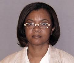 Convicted felon Monica Conyers will resign from the Detroit City Council effective July 6, the Associated Press is reporting. - monica-conyers-booking-photo-detroit-city-council