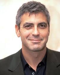 These styles can camouflage the hairline without looking forced the way some older styles did in the past. Image of George Clooney hairstyle for mature men. - clooney-caesar-haircut