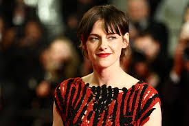 Kristen Stewart Debuts New Curtain Bangs in Cannes Rule-Bending Sheer Red Gown Made from String