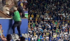 ¡Vergonzoso! Aficionado de Pumas protagoniza acto violento contra seguidores de Pachuca