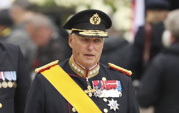 Queen Mette-Marit joins procession to bring late King Harald V's coffin to royal chapel; public to pay respects Tuesday, funeral set for Sept. 9