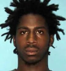 Hitch-hikier: Kareem Moore, from Florida, is behind bars after he inadvertently asked an undercover officer for a ride in Deerfield Beach, after leading ... - article-2590814-1C9E9BA200000578-24_634x685