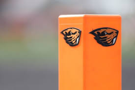Oregon State Beavers logo on a goal line pylon before a college football game