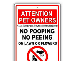 Image of warning sign for pet owners