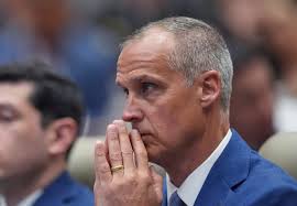 Corey Lewandowski Justice Department investigation 2026 exterior of DOJ building in Washington DC