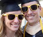 Nancy Unsworth and Scott Van Brunt, both MBA 12, in yellow glasses. The full-time MBA class of 2012 may have marched to Pomp and Circumstance on May 19, ... - llc
