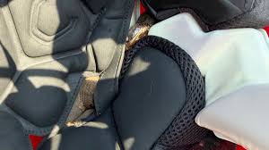 High school football player in Arkansas practices with a venomous snake in his helmet