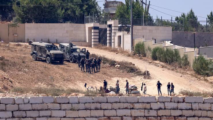U.S. Ambassador Mike Huckabee condemns 'horrific act of terror' as Israeli settlers besiege Palestinian American family's West Bank home