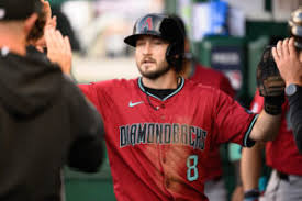 Reds Sign Garrett Hampson to Bolster Roster Amid Injuries