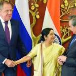 Russia, India, China meet, condemn