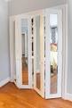 Bifold closet doors with mirrors