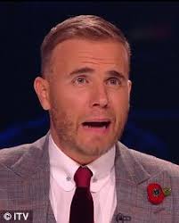 X Factor judges Tulisa wears Kleshna&#39;s £18.95 poppy ring, while Gary Barlow ... - article-0-0EAEAF5A00000578-290_224x278