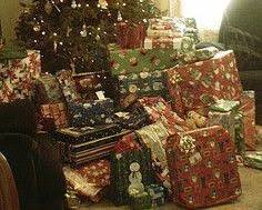 Image of Christmas tree with lots of presents under it