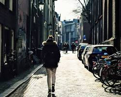 Image of person walking down a street