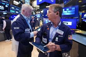 Wall Street inches to more records, thanks to booming AI stocks