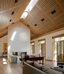 Image result for A traditionally styled great room with tall, angular cathedral ceilings