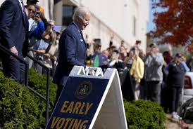 Biden casts 2024 election ballot near his Delaware home, waiting in line 
with other voters