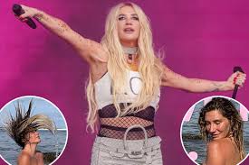 Kesha ditches her clothes to celebrate Earth Day in the ocean: ‘The divine feminine’