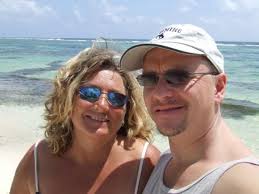 San Pedro, Belize: Tamara and I taking a break while cleaning the beach up - tamara-and-i-taking-a