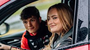 Ollie Bearman Guides Amelia Dimoldenberg in 'Passenger Princess' Driving Lessons