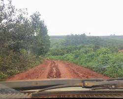 4x4 vehicle driving through a rugged trail in Ratanakiri, Cambodia