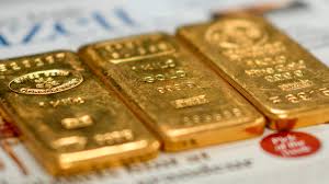 Gold falls more than 1% after Fed hikes interest rates
