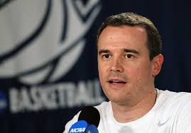 View full size Lehigh coach Brett Reed answers a question during a news conference last March in Greensboro, N.C. Reed is reportedly a strong candidate for ... - brett-reed-news-conference-775f83e7ea81d886