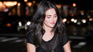 Selena Gomez Maximizes the Sheer Trend in a See-Through Shirt and Mesh Shoes