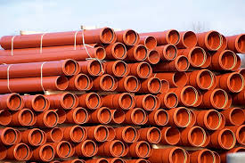 Orange Drainage Pipes In Road Construction Stock Photo ...