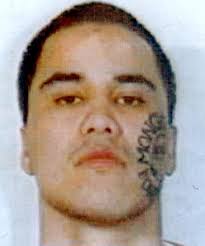 PAST LOOK: John Gillies seen sporting a &#39;Mongrel Mob Forever&#39; facial tattoo, which cost the taxpayer $4500 to remove. - 9107127