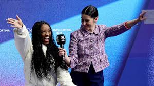 Simone Biles Supports Ilia Malinin at Olympics Figure Skating Event