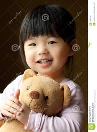 Smiling little child with a teddy bear Stock Photo &middot; Smiling little child with a teddy bear - smiling-little-child-teddy-bear-13740010