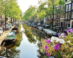 Image of Jordaan neighborhood in Amsterdam with its narrow streets and canals