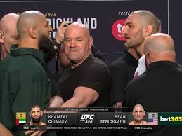Khamzat Chimaev Kicks Sean Strickland at UFC 328 Presser