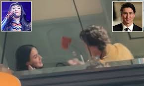 Katy Perry and Justin Trudeau are 'enamored' with each other