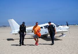 Plane makes emergency landing on sand at Huntington Beach after takeoff from John Wayne Airport