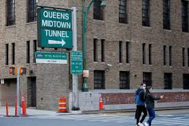 Queens-Midtown Tunnel shut down due to flooding, causing traffic gridlock