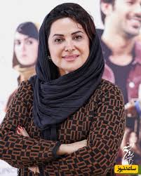 نگاهی به استایل کلاسیک کمند امیرسلیمانی با مانتوی قرمز و شیک