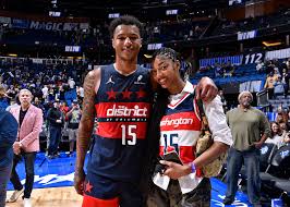 Angel Reese supports brother, Julian Reese courtside at Wizards game