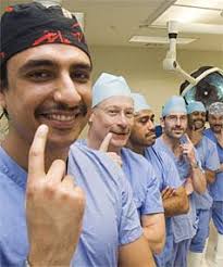 FACIAL EXPRESSION: Urology doctors Homi Zargar, Stephen Coppinger, Jo Turagava, Quinten King, Raj Patel, and Christopher Chemsale display their moustaches. - 3081964