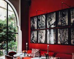 Image of trendy restaurant with a black, white, and red color scheme