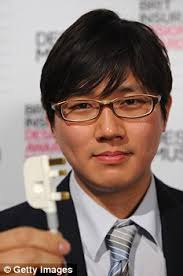 Inventor Min-Kyu Choi with his award-winning Folding Plug - article-1258426-08BF1487000005DC-682_233x351