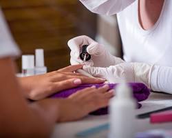 Image of woman getting a manicure